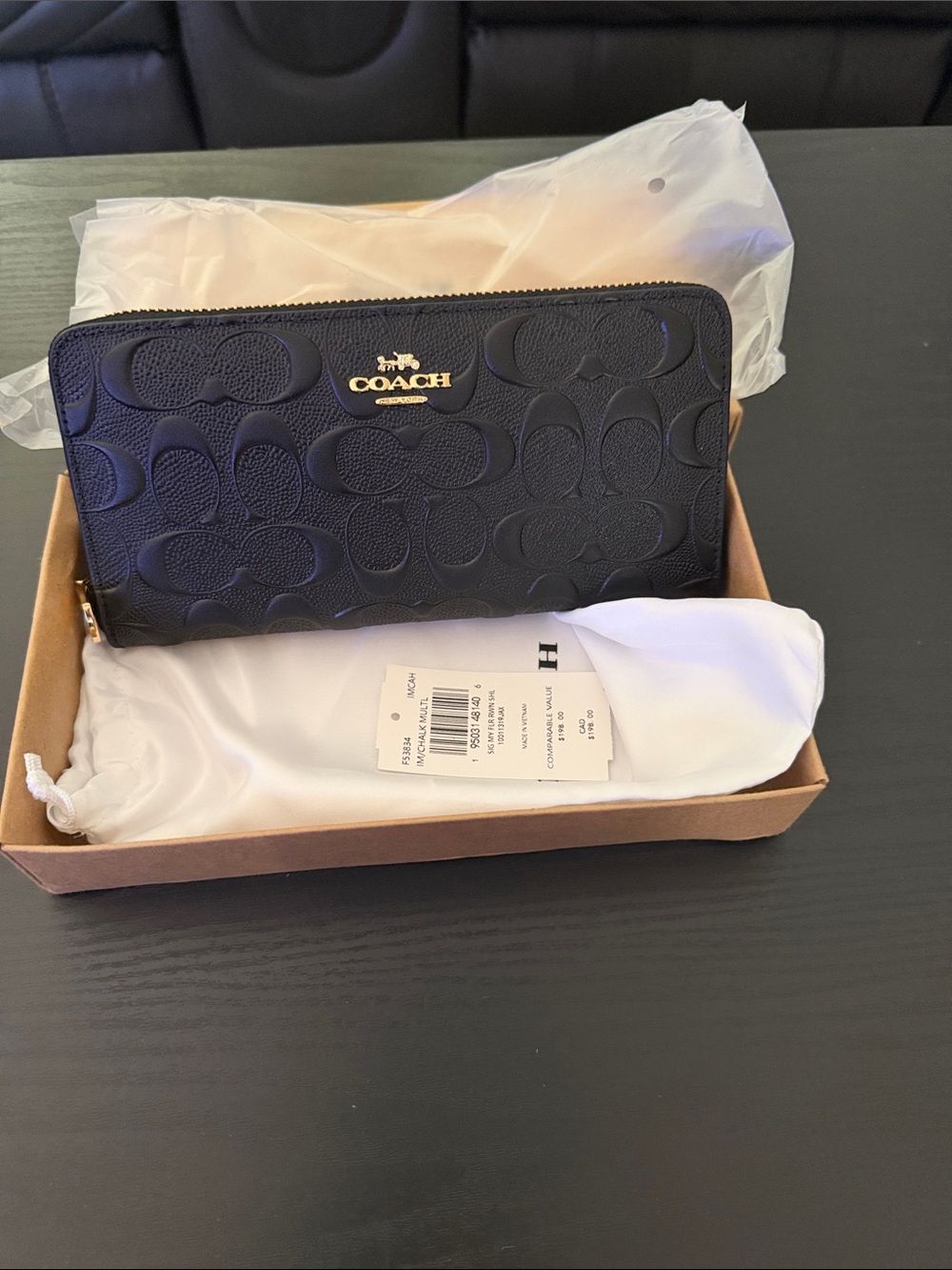 Brand New in Box Coach Black leather pebbled long Zip Wallet with Gold Logo